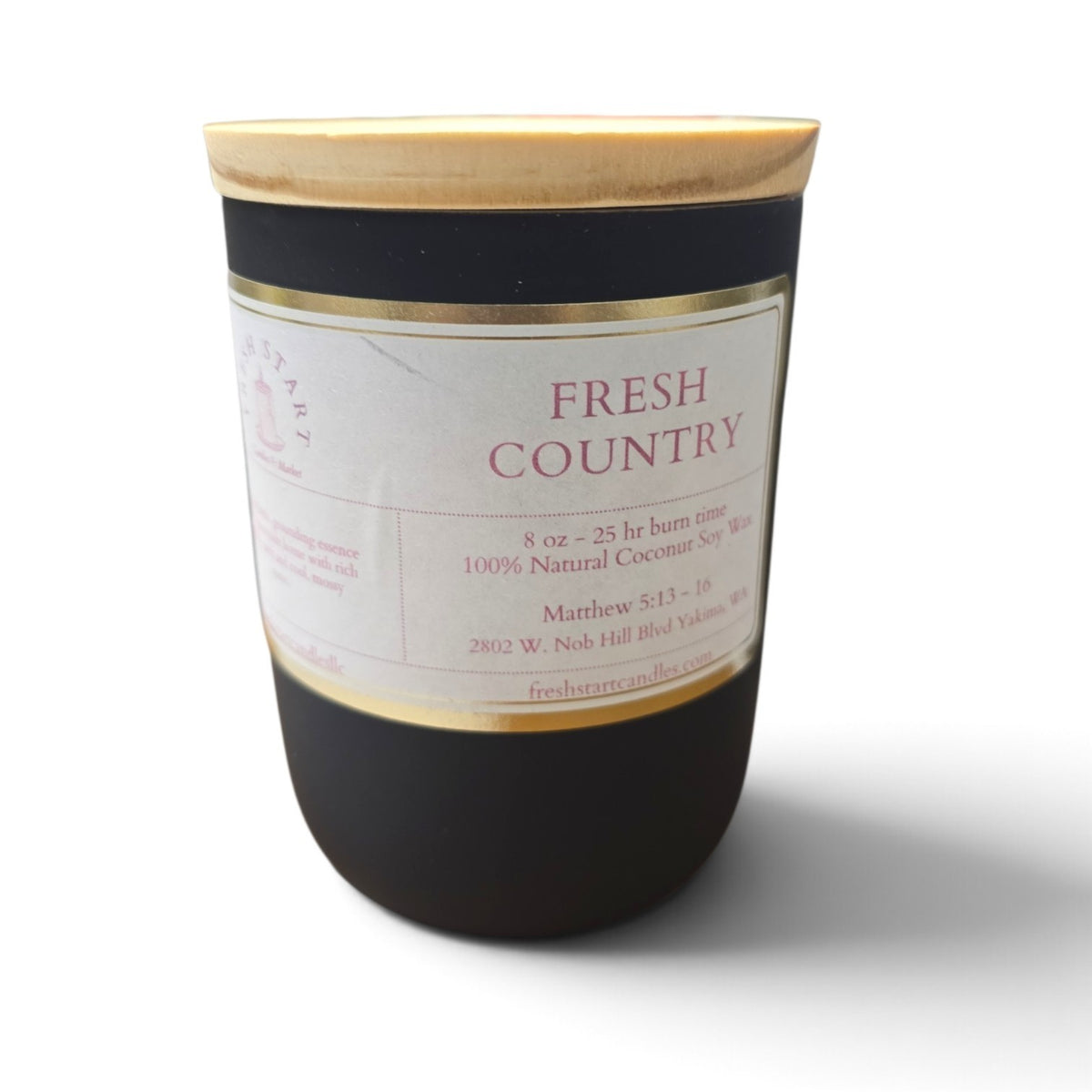 Fresh Start Candles Fresh Country 8oz coconut and soy wax candle in a matte black jar with a wooden lid.