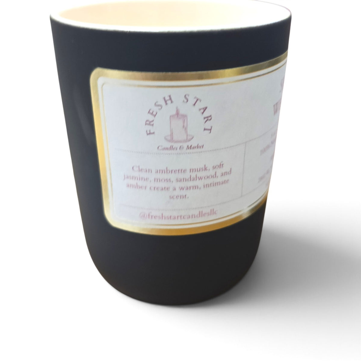 Fresh Start Candles Sheer Whisper 8oz candle in a matte black vessel with a gold-bordered label.
